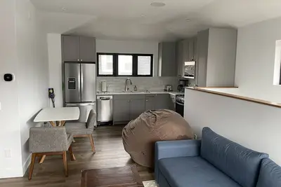 Image de Bright, Walkable City Guesthouse! Brand new construction with lake views!