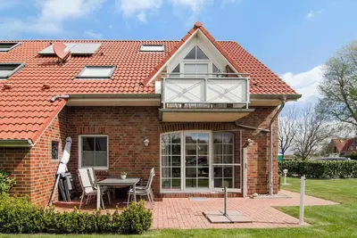 Image de Appartement 'Ferienwohnung Maren-marie' avec terrasse privée, jardin privé et Wi-Fi