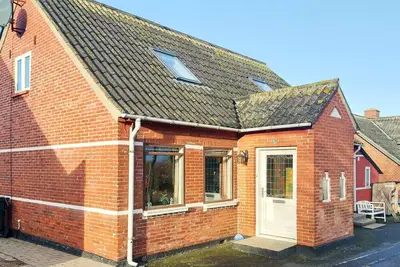 Image de Maison de vacances pour 14 a Bagenkop-By Traum