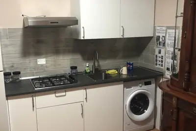 Image de Accogliente Appartamento con Cucina, Camera e Parcheggio