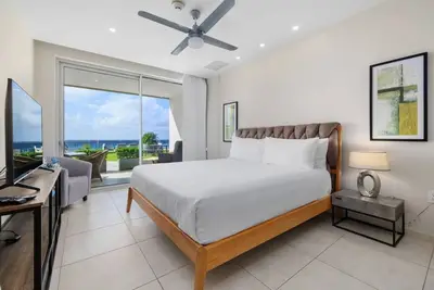 Chic & Modern Oceanview Condo Steps from Eagle Beach at O Condo 35 by Bocobay