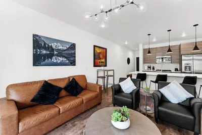 Image de Centrally Located Condo with Private Balcony with Blue River Views!