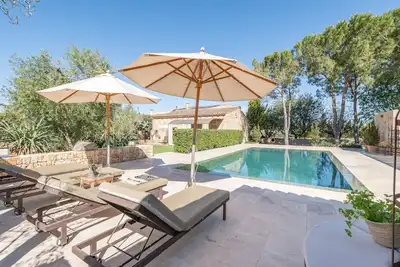 Image de Villa 'Es Lledoner 2' avec vue sur les montagnes, piscine partagée et Wi-Fi