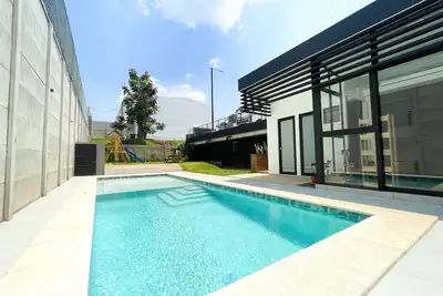 Image de Apartamento Moderno Orange Place + Wifi+ Pool+ Gym