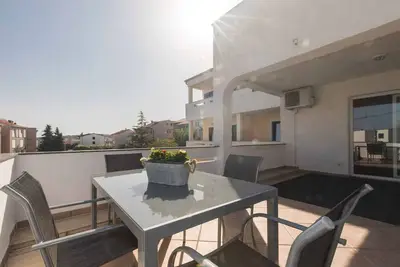 Image de Appartement de vacances avec piscine d'eau salée chauffable