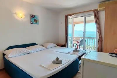 Image de Apartment & Rooms Tempera / Triple Room with Sea and City view