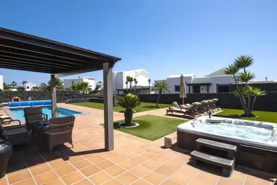 Image de Marvelous Playa Blanca Villa | 2 Bedrooms | Villa Kagura | Spacious Sun Terrace | Outdoor Pool, Hot Tub and Bbq | Montana Roja