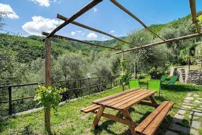 Image de Maison de vacances 'La Casa Di Bosco' avec vue sur la montagne, jardin privé et Wi-Fi