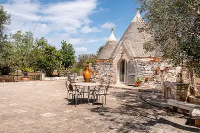 Image de Maison de vacances 'Villa Trullo Ulivo' avec piscine privée, Wi-Fi et climatisation