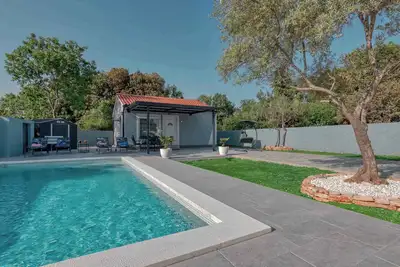 Image de Maison de vacances avec piscine près de la plage