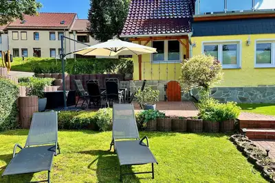 Image de Ferienhaus Hüttenblick - Ferienwohnung Seidenglanz