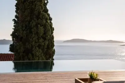 Image de Luxury sea view villa with a heated infinity pool and a stunning sunset