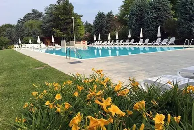 Image de Oasis of Relaxation in Punta Grò - Two-room apartment with Pool and Nearby Beach