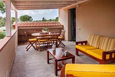 Image de Appartement 'Appartamento 4' avec terrasse privée, jardin partagé et climatisation