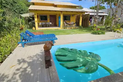 Image de Vila Axé Casa Amarela Guaratiba Prado/ba 2qts, ar, piscina, 50m da Praia. 8 Pessoas