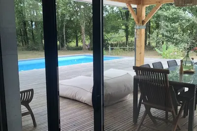 Image de Villa 170 m2, Soulac/mer 10 min. Terrain Arboré  3000m2 piscine privée /chauffée.