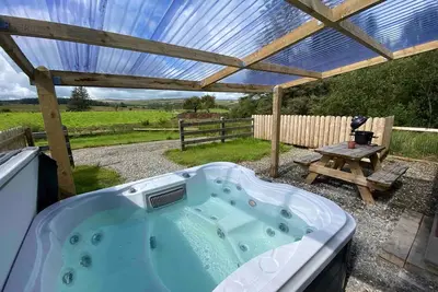 Image de 1 bedroom cottage with private hot tub.