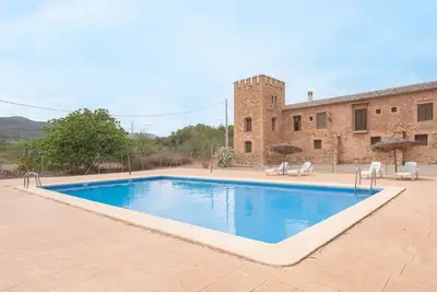 Image de Appartement 'Casa Pablo' avec vue sur les montagnes, piscine et jardin partagés