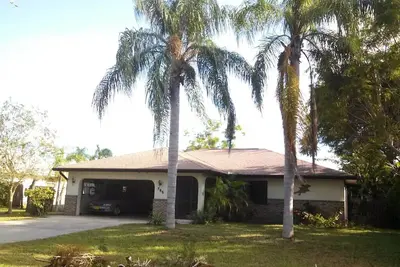 A private residence- backyard with a pool.