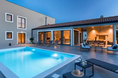 Image de Villa Gardenia avec piscine et jardin
