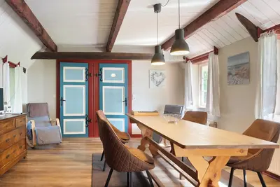 Image de Appartement 'Fewo 2 - Pohns Warft' avec jardin partagé et Wi-Fi