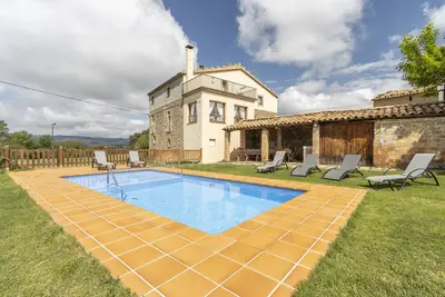 Image de Maison de vacances 'Casa Ponet' avec vue sur les montagnes, piscine privée et Wi-Fi