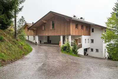 Image de Appartement 'Latemar' avec vue sur les montagnes, jardin partagé et Wi-Fi