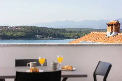 Image de Appartement de vacances avec climatisation et vue sur la mer