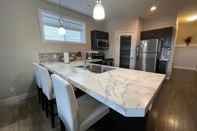 Image de Cozy Private Suite | Free Wifi | Stocked Kitchen