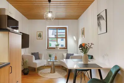 Image de Appartement 'Schönauer Hof - Wohnung Max Josef' avec terrasse partagée et Wi-Fi