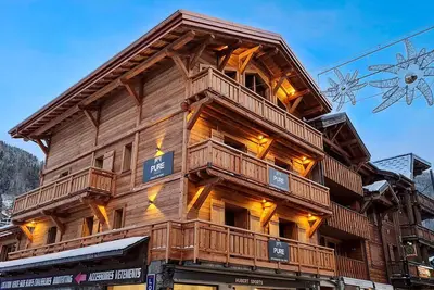 Image de Chalet de 20 personnes en plein centre avec sauna et jacuzzi