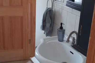 Image de Quiet Bayside cottage. 10 minutes to beach, 15 minutes to shopping.