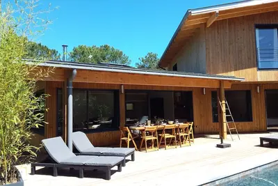 Image de Villa neuve en bois à 7 mn en vélo de la plage