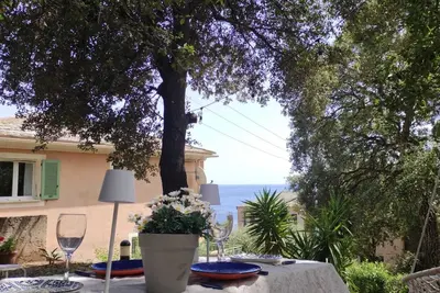 Image de Magnifique vu mer deux chambres jardin ombragé balcon à 5 min à pieds de la mer