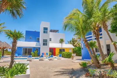 Vibrant and colorful ocean side villa with pool, Ac and much more!