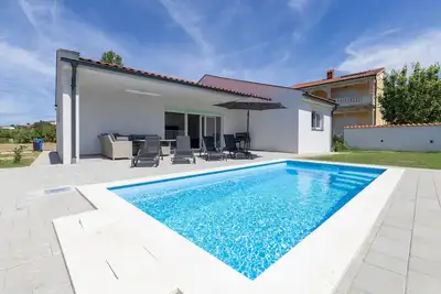 Image de Belle maison à Kampor avec WiFi