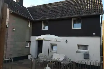 Image de Maison de vacances 'Eifels Herzhaus' avec terrasse partagée et Wi-Fi