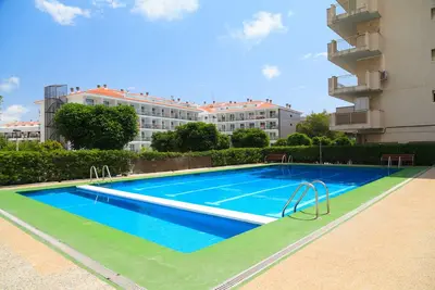 Image de Appartement centre-ville · Plage 100m · Piscine Uhc Pino Alto 187