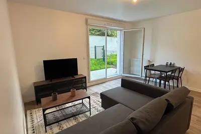 Image de Appartement avec un jardin