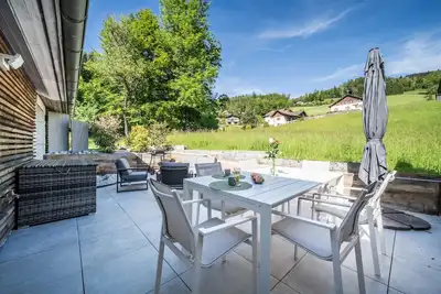 Image de Appartement 'Bois Joli Spa-terrasse Privatisés' avec terrasse privée et Wi-Fi