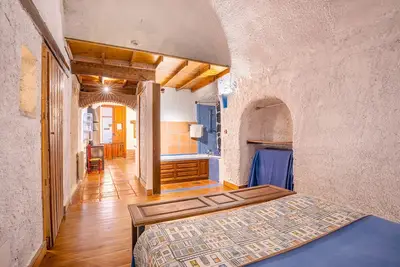 Image de Maison de vacances 'Cueva Trigo' avec vue sur la montagne, piscine partagée et Wi-Fi