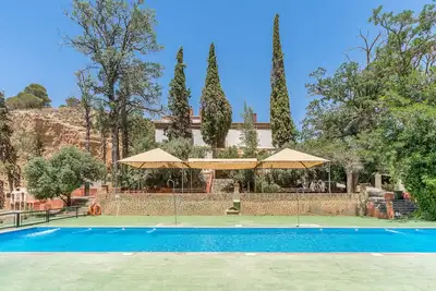 Image de Appartement 'Cueva Alba' avec vue sur la montagne, piscine partagée et Wi-Fi
