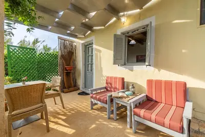 Image de Maison de vacances 'Myrto' avec vue sur la mer, terrasse privée et climatisation