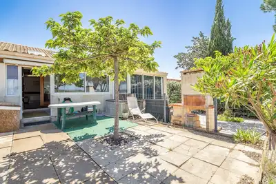 Image de Maison de vacances 'Les Eaux Vives 1' avec vue sur la mer, piscine partagée et terrasse privée