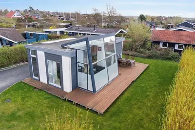 Modern summer house with fantastic skylight.