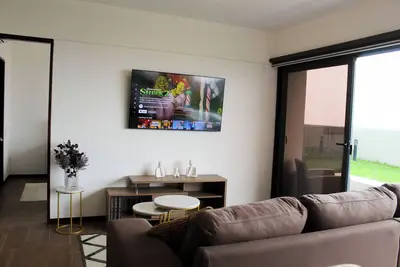 Image de Comodo Apartamento en San Salvador con Vista Genial, Terraza y Jardín Privado