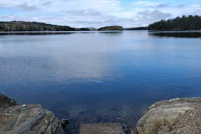 Image de Maine Lake House with gorgeous views, swim, kayak and fish off private dock.