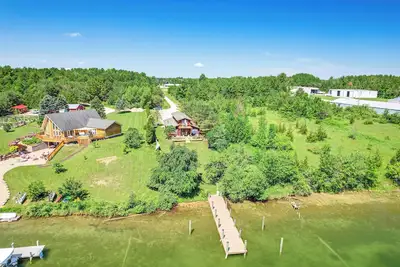 Image de Riverfront Cheboygan Home w/ Dock ~ 4 Mi to Town!