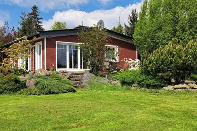 Image de Maison de vacances 'Ferienhaus Chalet Bergblick' avec vue sur la montagne, terrasse privée et Wi-Fi