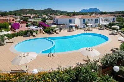 Image de Appartement 'Lazulite - Sardinia Vacation' avec piscine partagée, Wi-Fi et climatisation